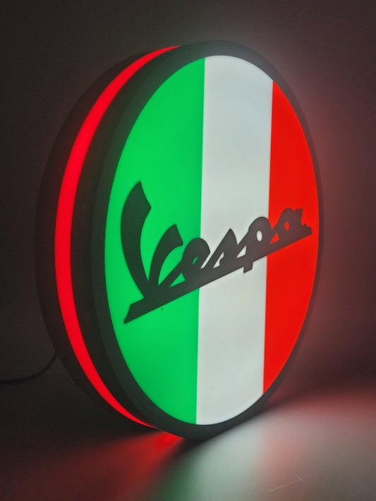 vespa led light sign with illuminated logo viewed from side view