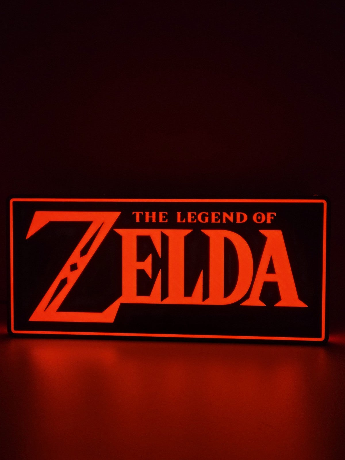 Zelda LED light sign with illuminated logo viewed from straight on