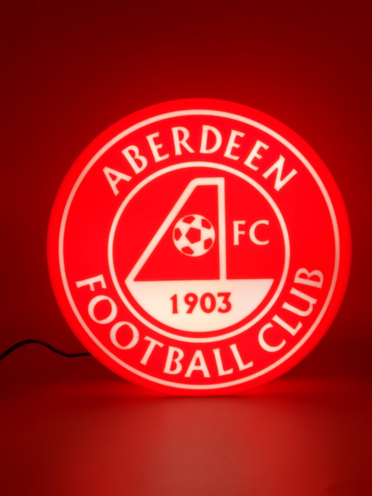 Aberdeen LED light sign with illuminated logo viewed from straight on