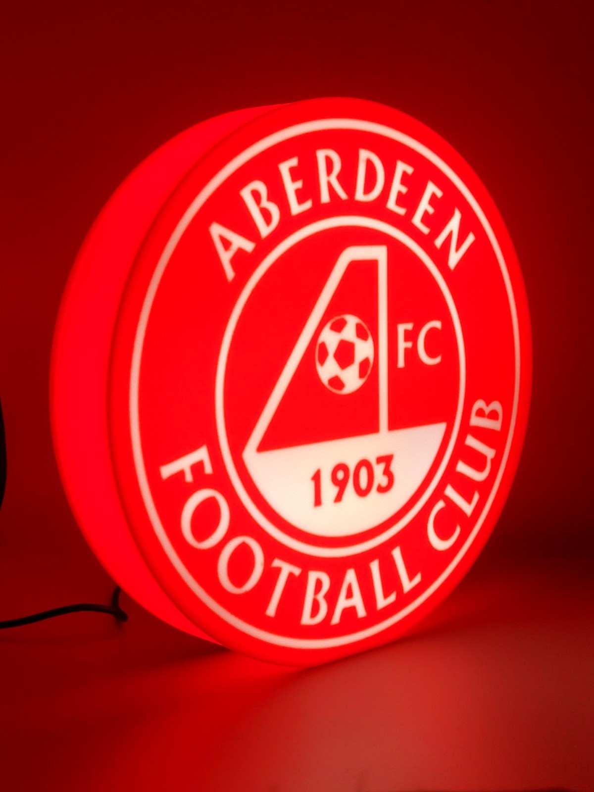 Aberdeen F.C. LED light sign with illuminated logo viewed from side view