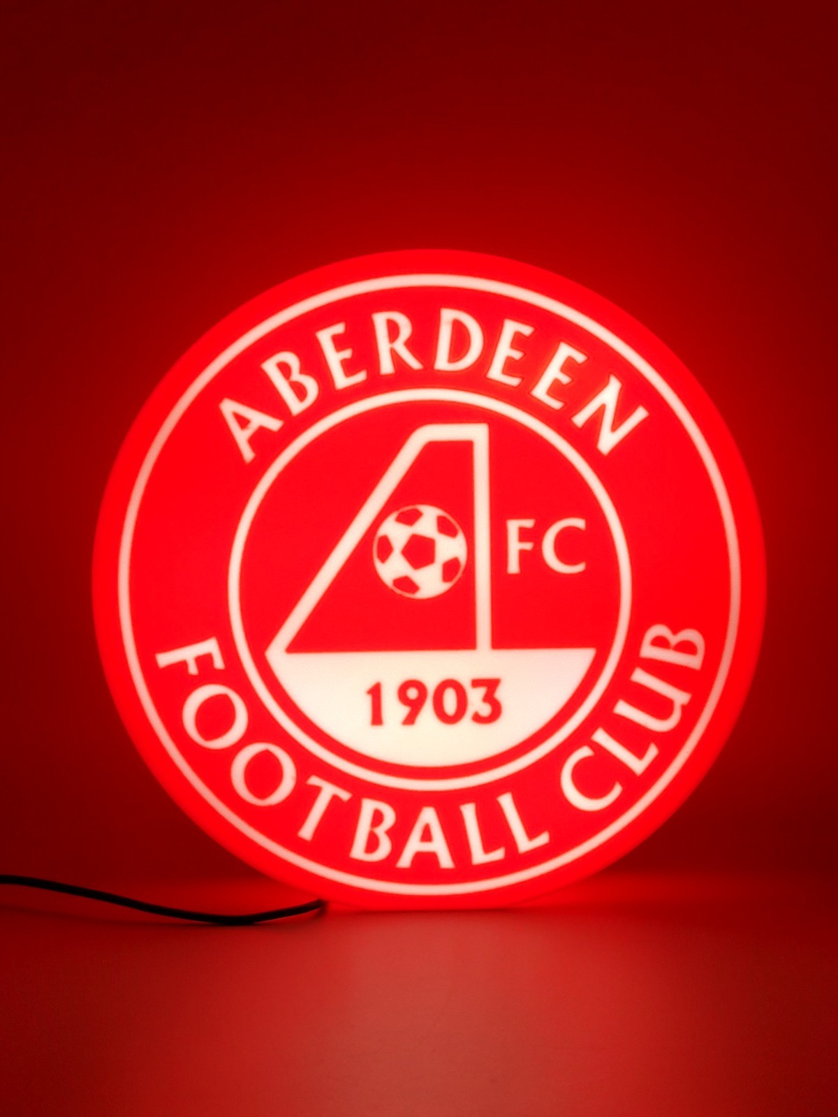 Aberdeen LED light sign with illuminated logo viewed from straight on