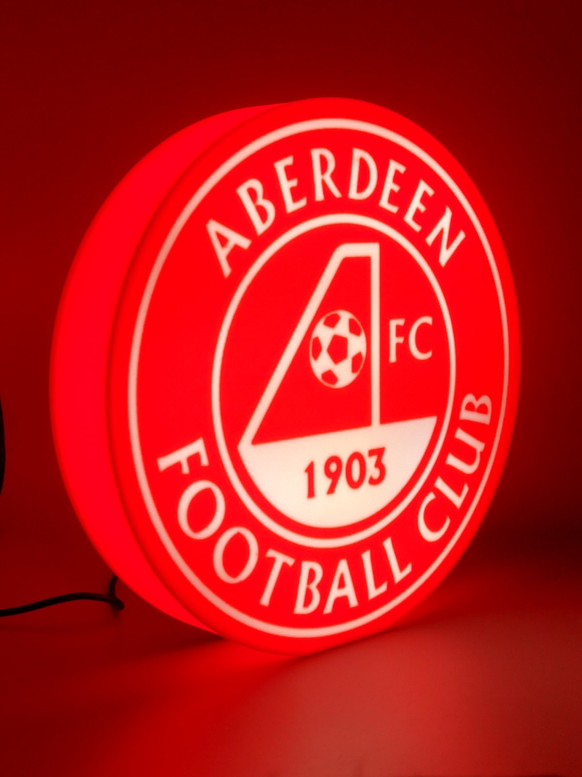 Aberdeen F.C. LED light sign with illuminated logo viewed from side view