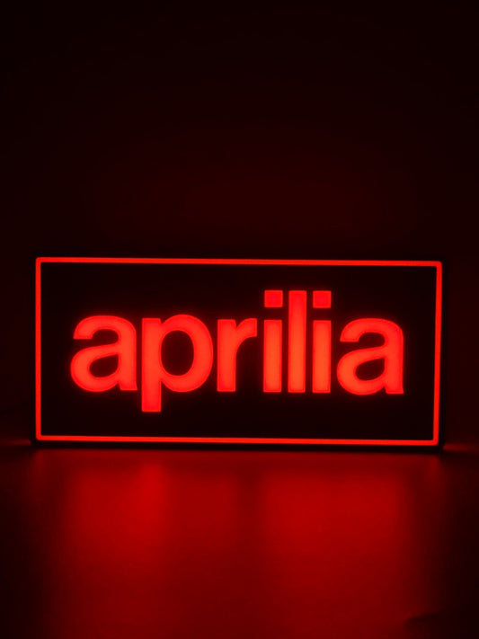 Aprilia led light sign with illuminated logo viewed from straight on