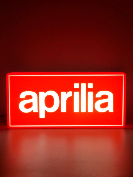 Aprilia led light sign with illuminated logo viewed from straight on