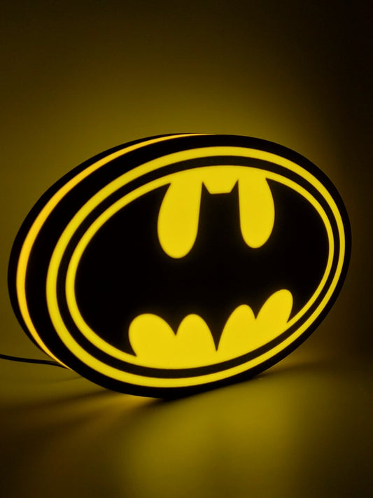 Batman led light sign with illuminated logo viewed from side view