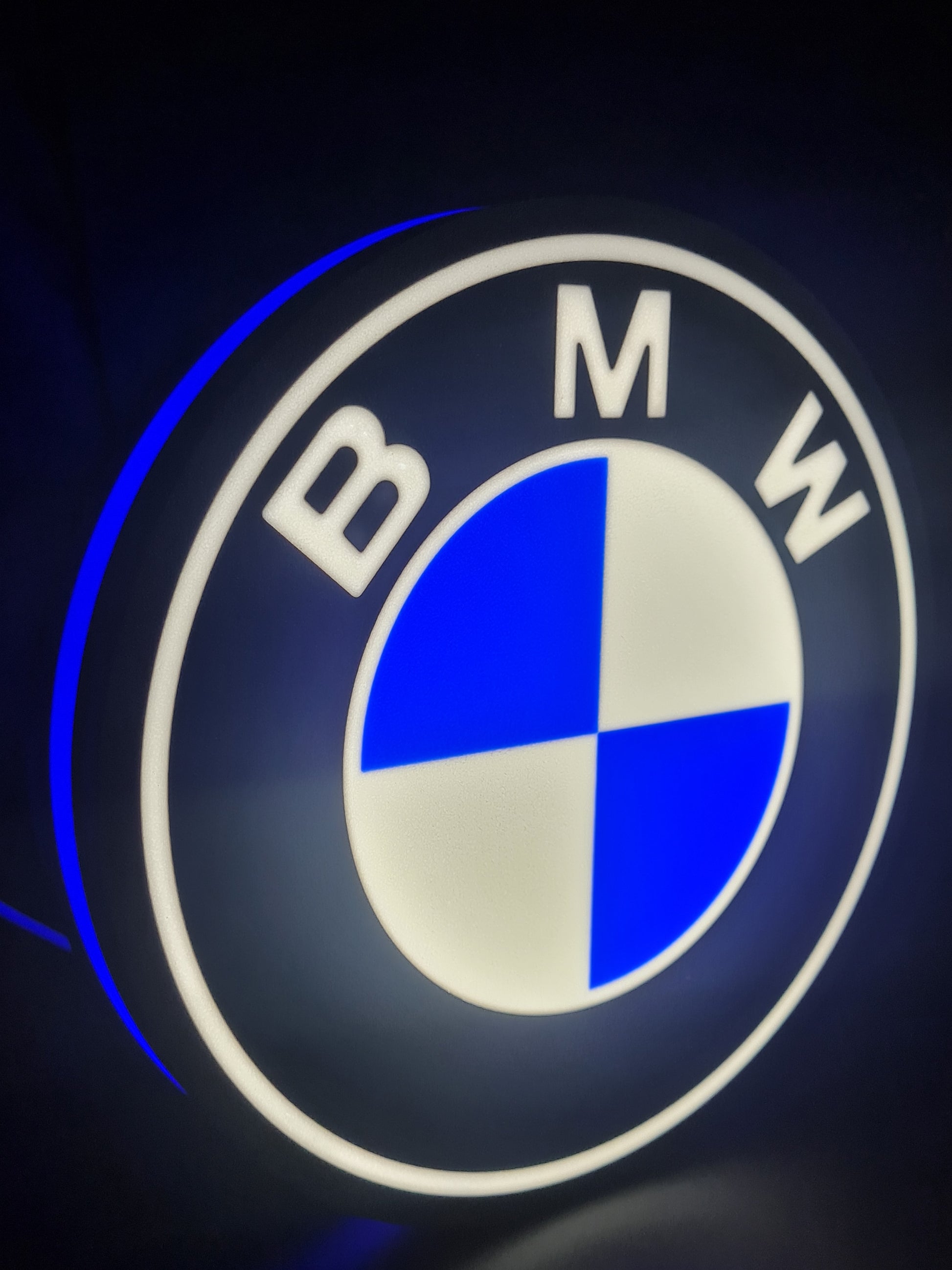 bmw led light sign with illuminated logo viewed from side view