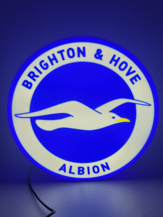 Brighton and Hove F.C. LED light sign with illuminated logo viewed from straight on