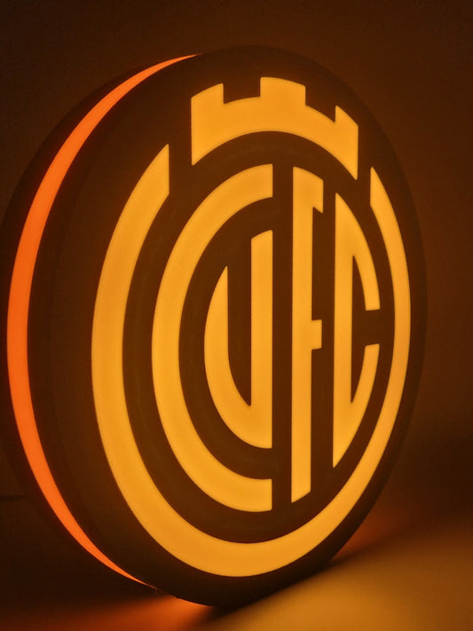 Cambridge FC led light sign with illuminated logo viewed from side view