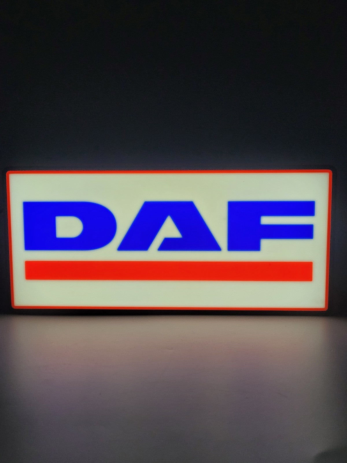 DAF led light sign with illuminated logo viewed from straight on