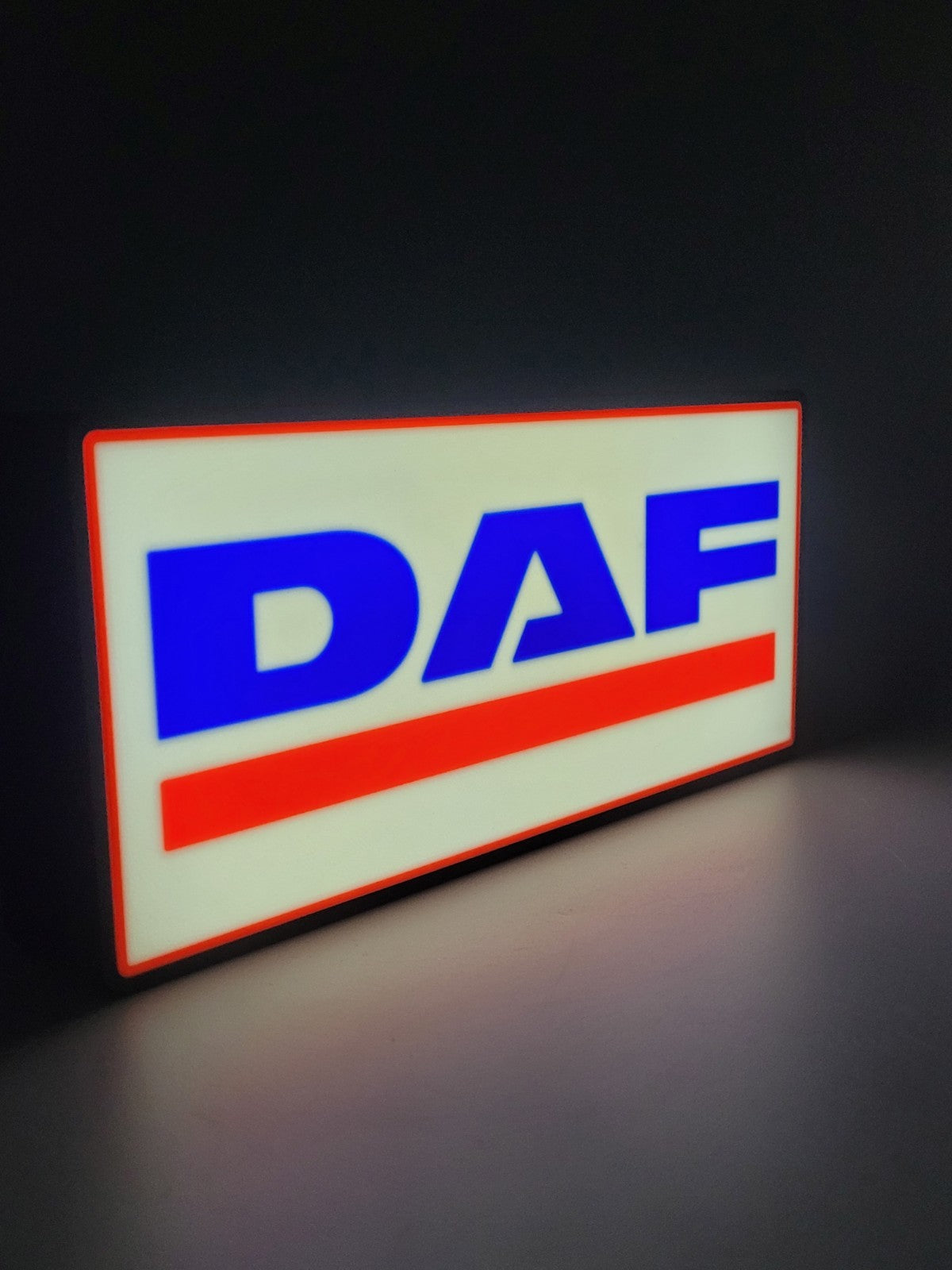 DAF led light sign with illuminated logo viewed from side view