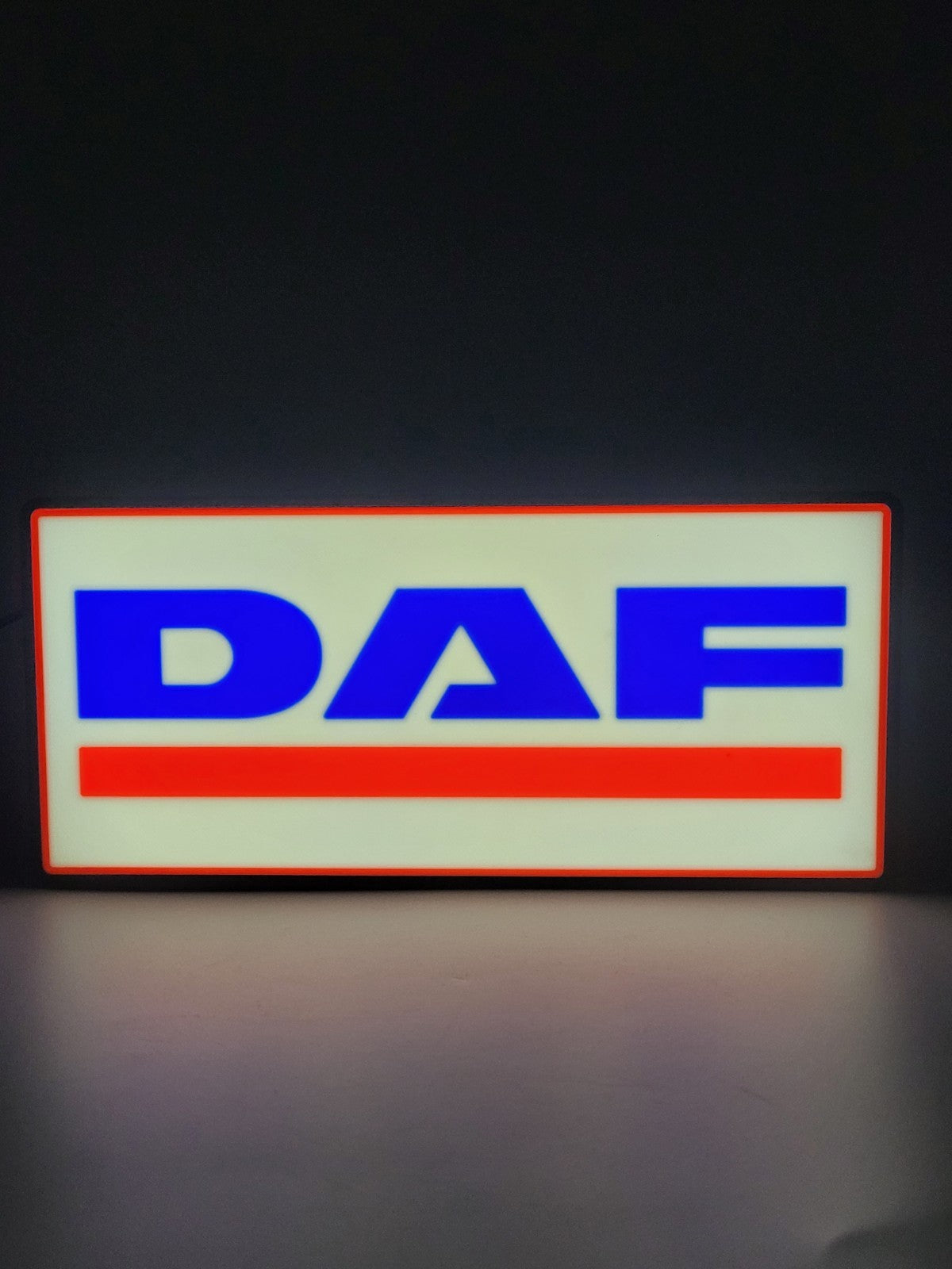 DAF led light sign with illuminated logo viewed from straight on
