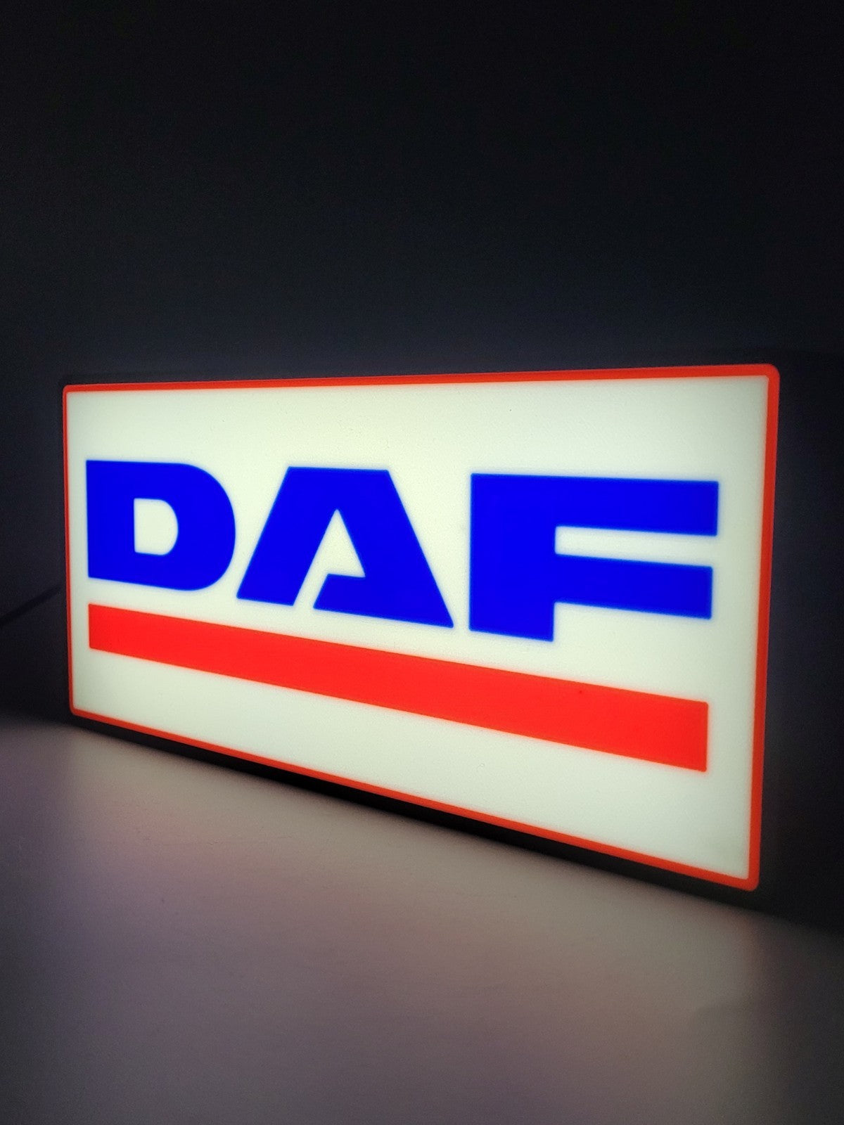 DAF led light sign with illuminated logo viewed from side view