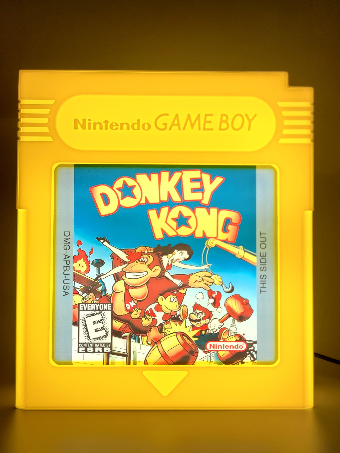 donkey kong gameboy cartridge LED light sign with illuminated logo viewed from straight on