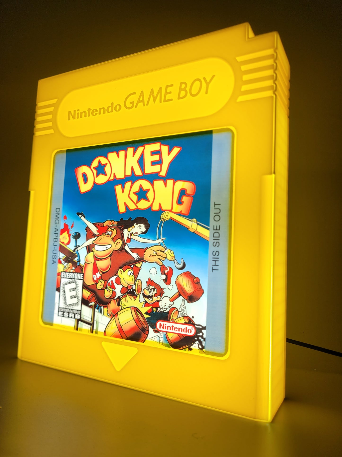 donkey kong gameboy giant cartridge yellow led light sign with illuminated logo viewed from side