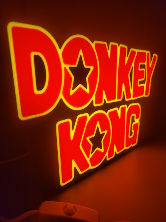 Donkey Kong led light sign with illuminated logo viewed from side view