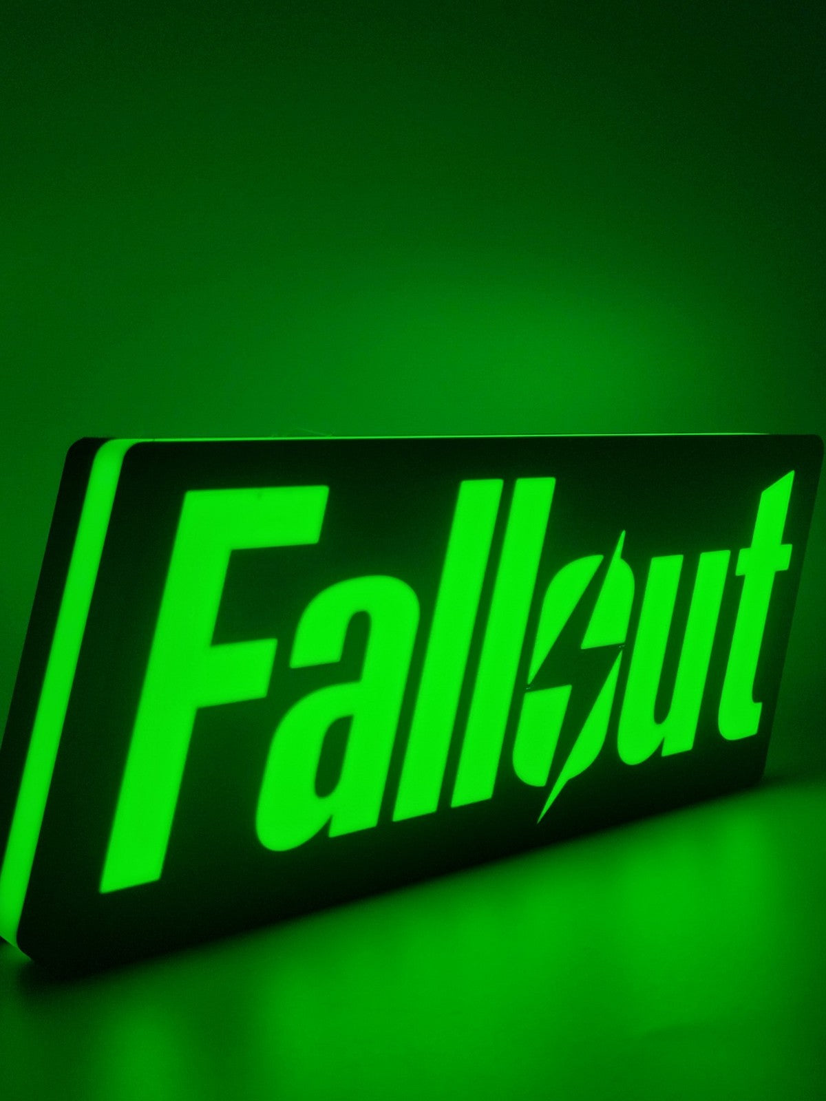Fallout LED light sign with illuminated logo viewed from side view