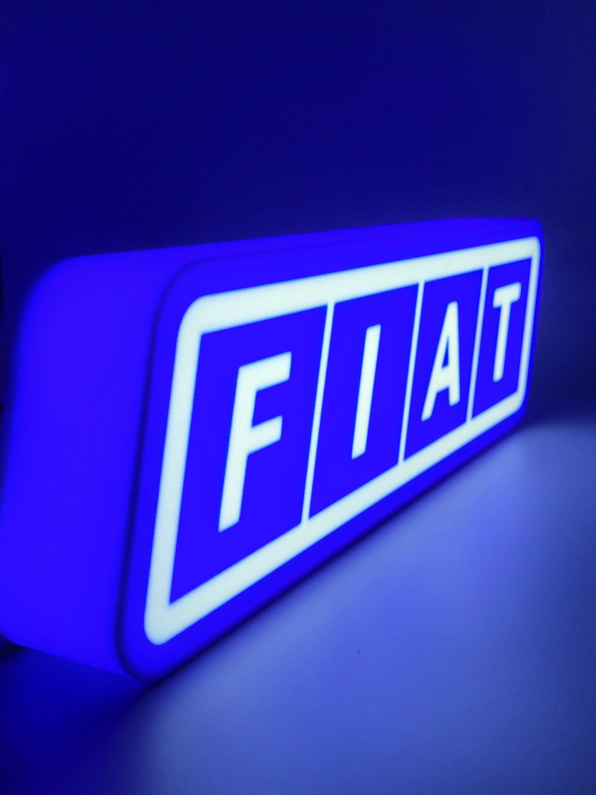 FIAT led light sign with illuminated logo viewed from side view