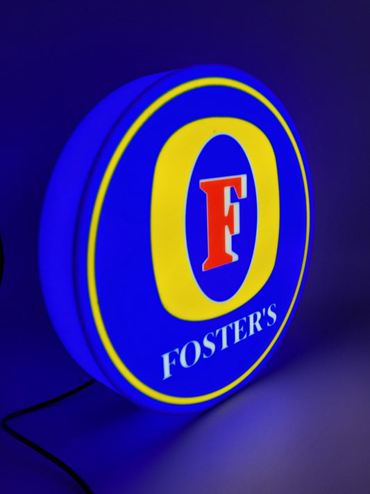 FOSTERS led light sign with illuminated logo viewed from side view