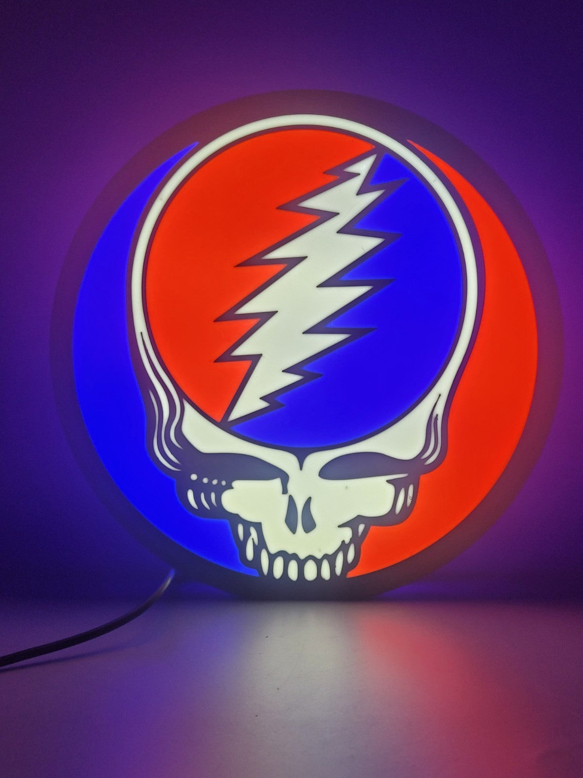 Greatful Dead led light sign with illuminated logo viewed from straight on