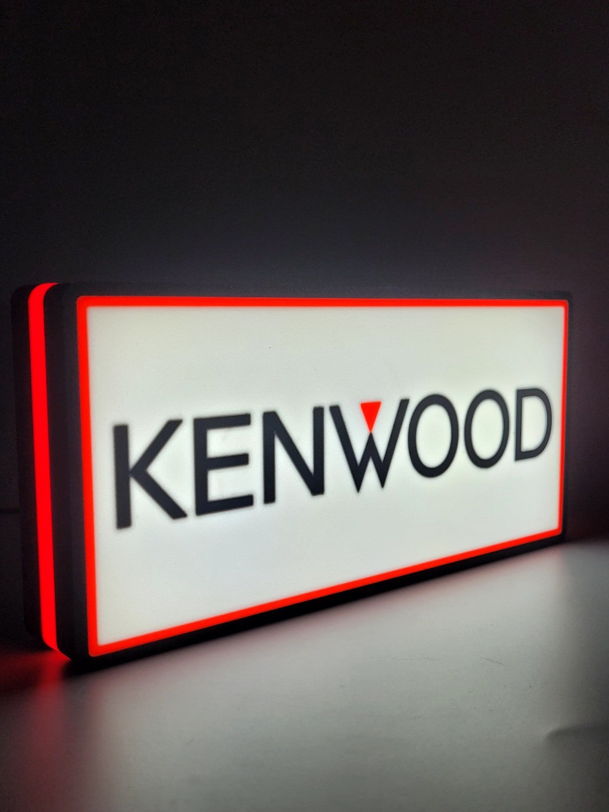 KENWOOD led light sign with illuminated logo viewed from side view