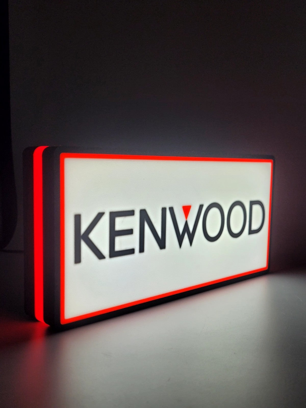 KENWOOD led light sign with illuminated logo viewed from side view