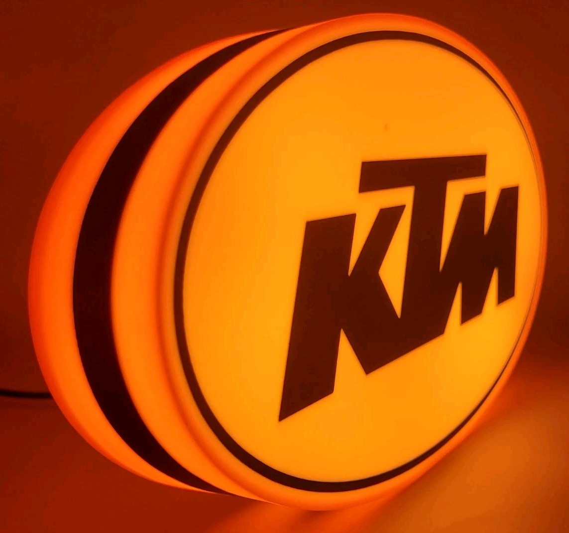 KTM led light sign with illuminated logo viewed from side view