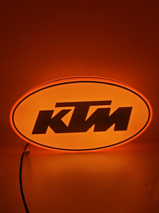 KTM led light sign with illuminated logo viewed from straight on