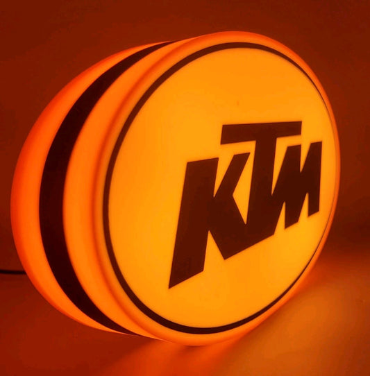 KTM led light sign with illuminated logo viewed from side view