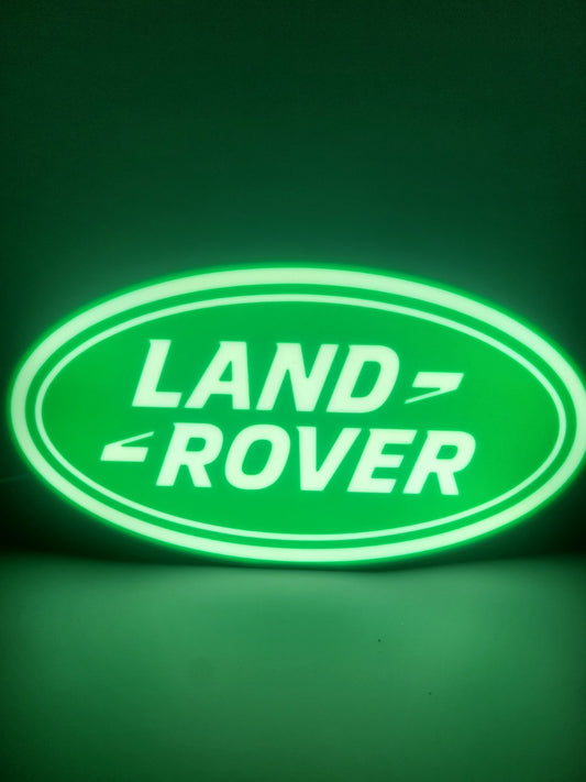 Land Rover LED light sign with illuminated logo viewed from straight on