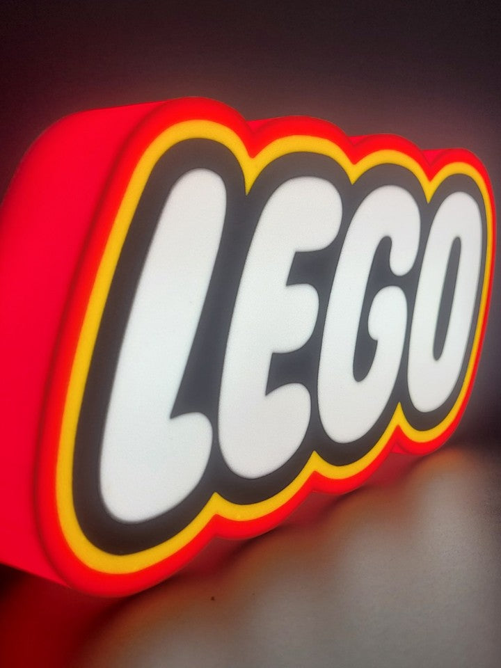 Lego LED light sign with illuminated logo viewed from side view