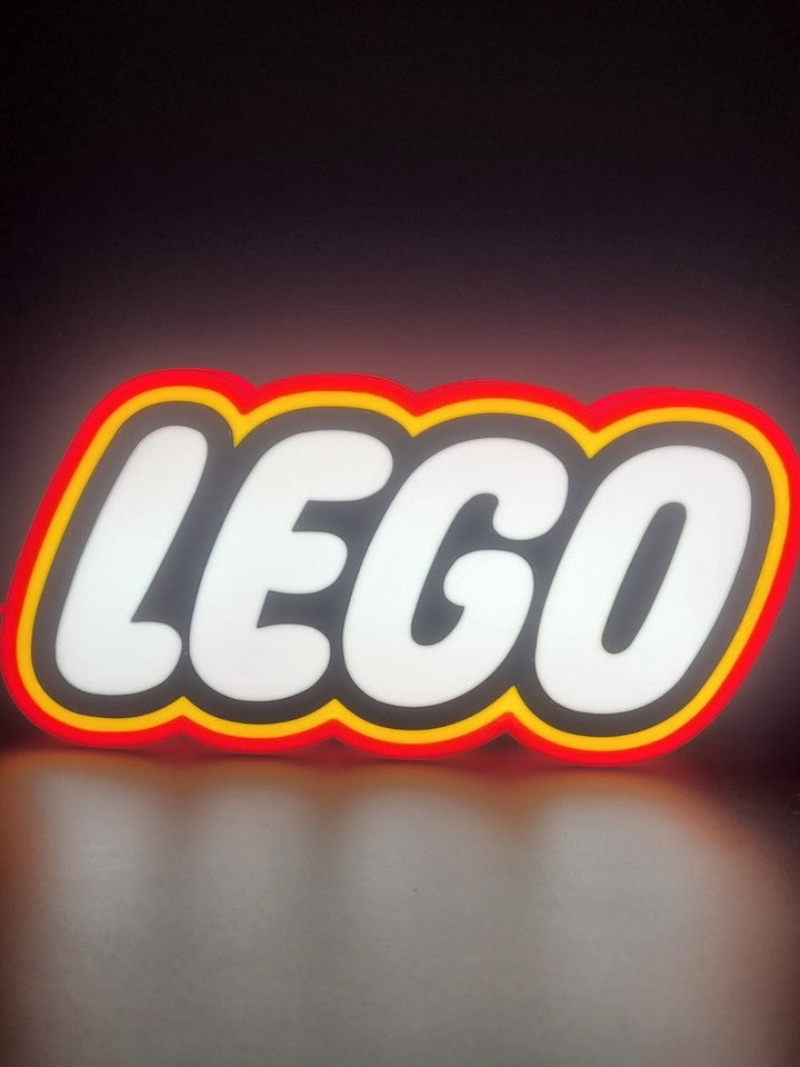 Lego LED light sign with illuminated logo viewed from straight on