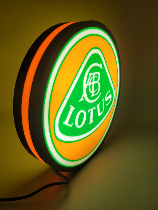 Lotus LED light sign with illuminated logo viewed from side view