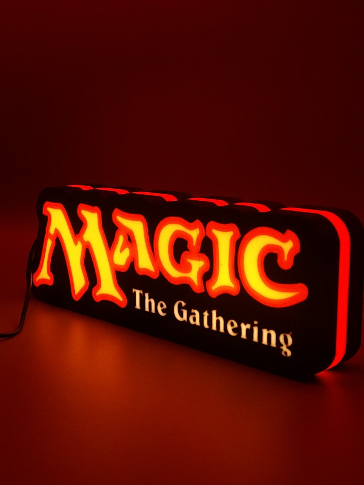 MAGIC THE GATHERING led light sign with illuminated logo viewed from side view