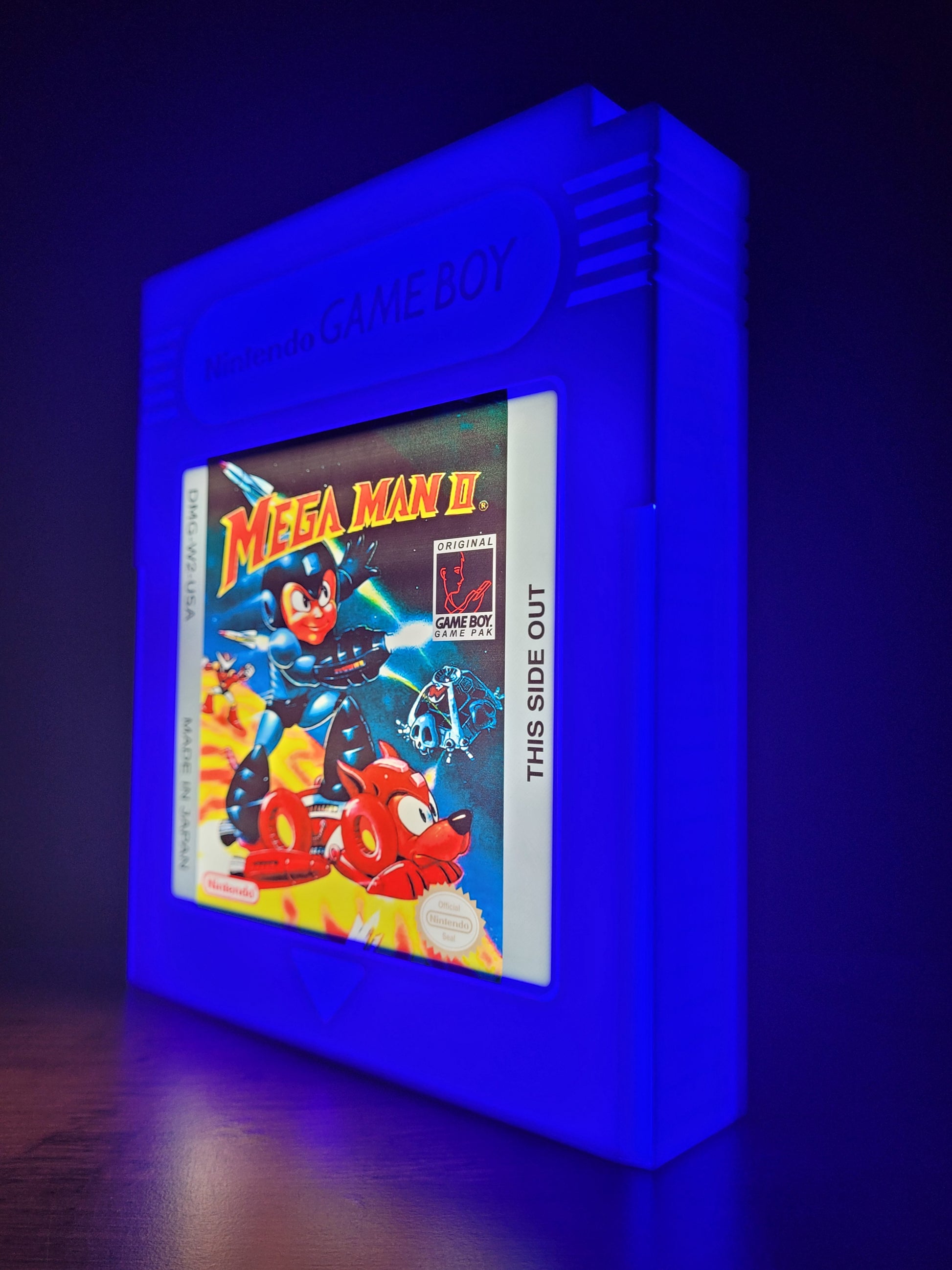 mega man giant cartridge led light sign with illuminated logo viewed from side view