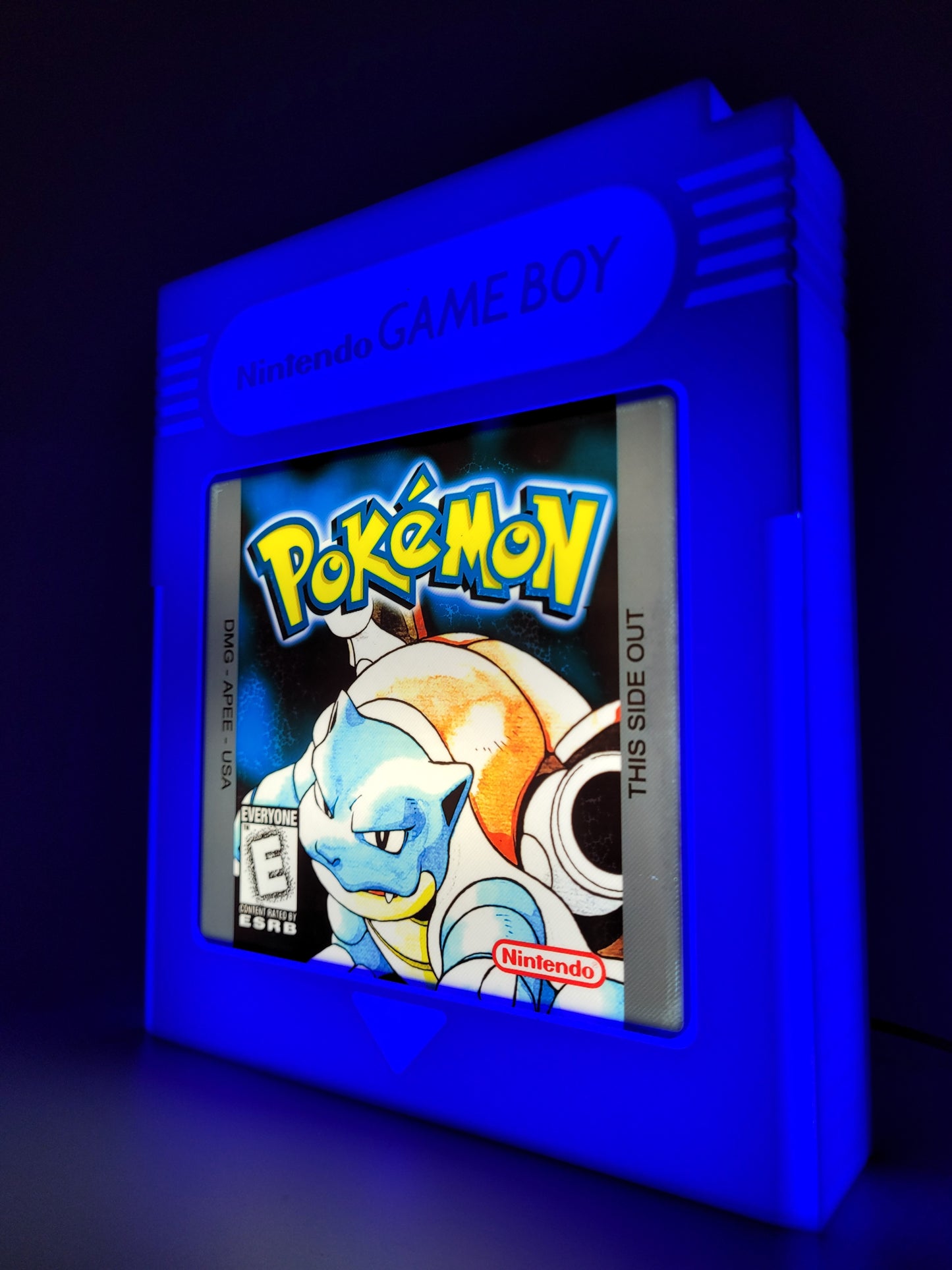 pokemon blue giant cartridge led light sign with illuminated logo viewed from side 