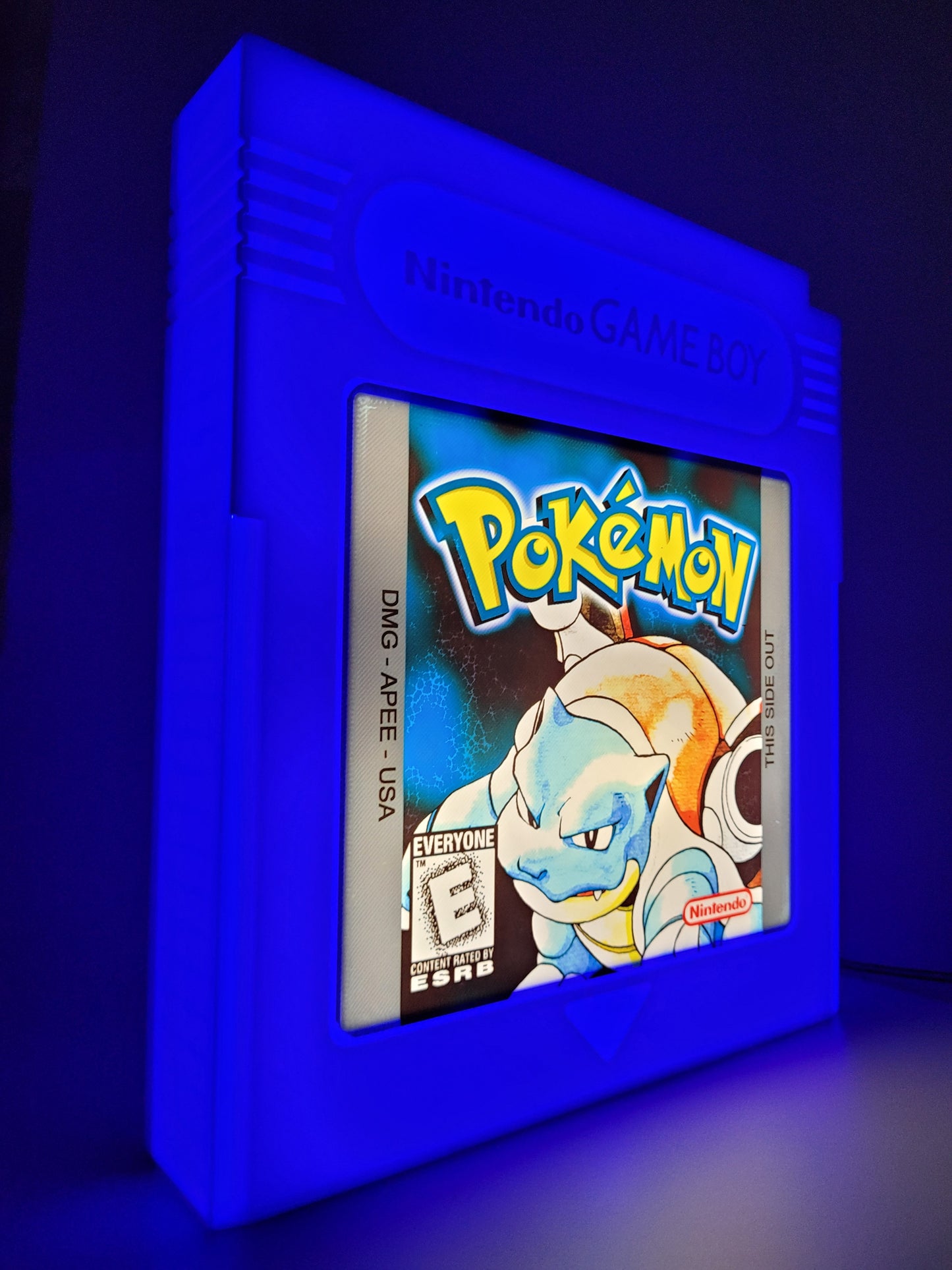 pokemon blue giant cartridge led light sign with illuminated logo viewed from side 