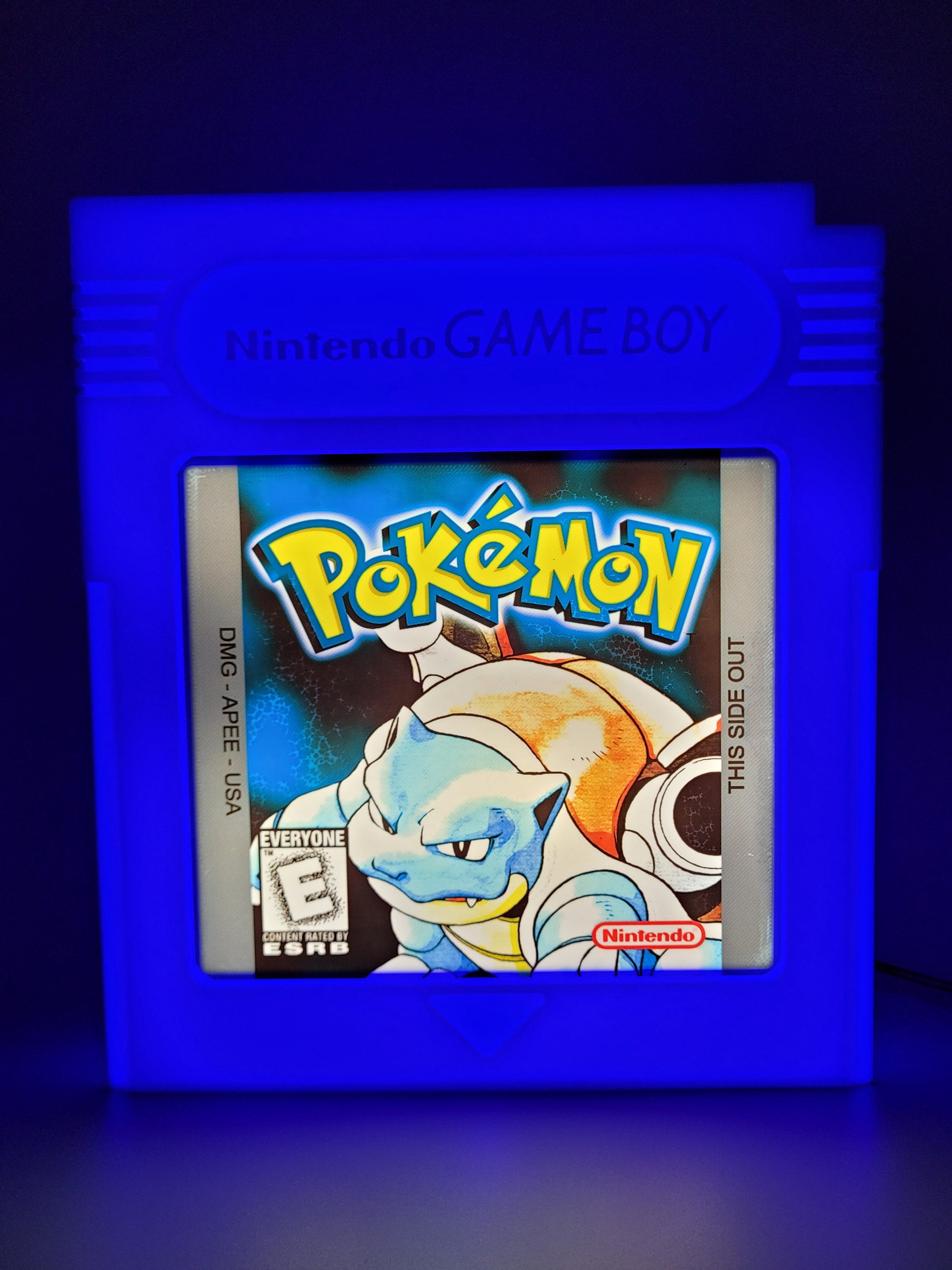 POKEMON BLUE GAMEBOY CARTRIDGE LED light sign with illuminated logo viewed from straight on