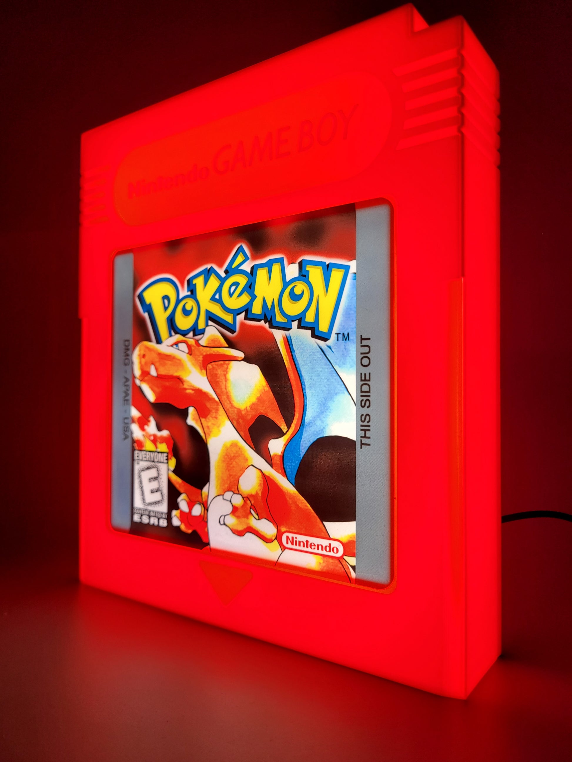 pokemon red giant cartridge led light sign with illuminated logo viewed from side 