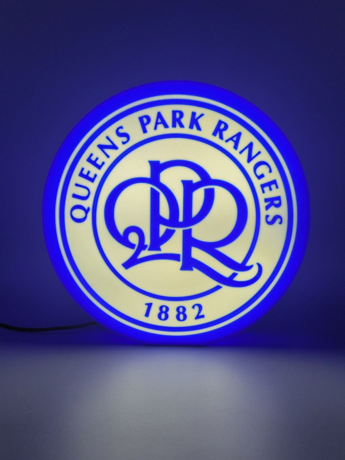 Queens Park Rangers QPR LED light sign with illuminated logo viewed from straight on