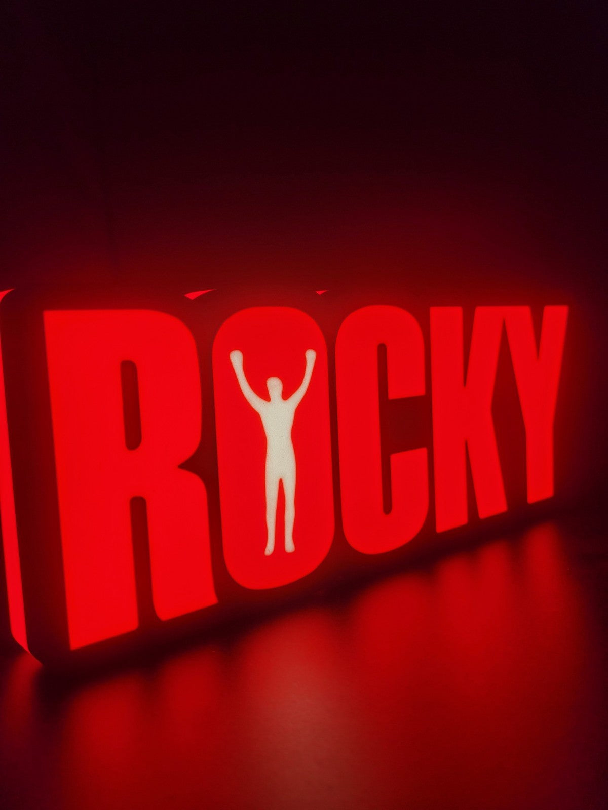 ROCKY led light sign with illuminated logo viewed from side view