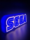 Sega LED light sign with illuminated logo viewed from side view