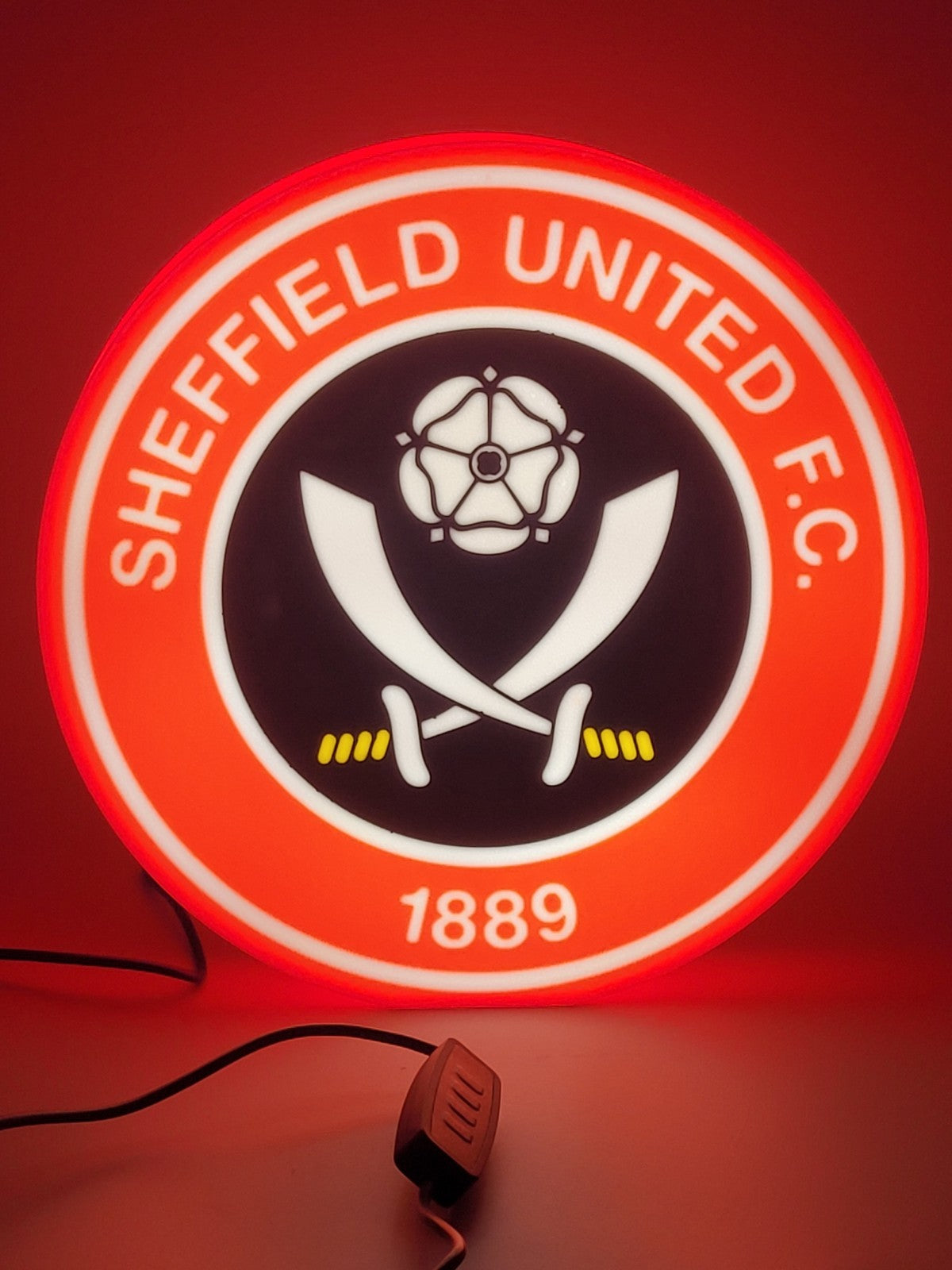 Sheffield United F.C. LED light sign with illuminated logo viewed from straight on