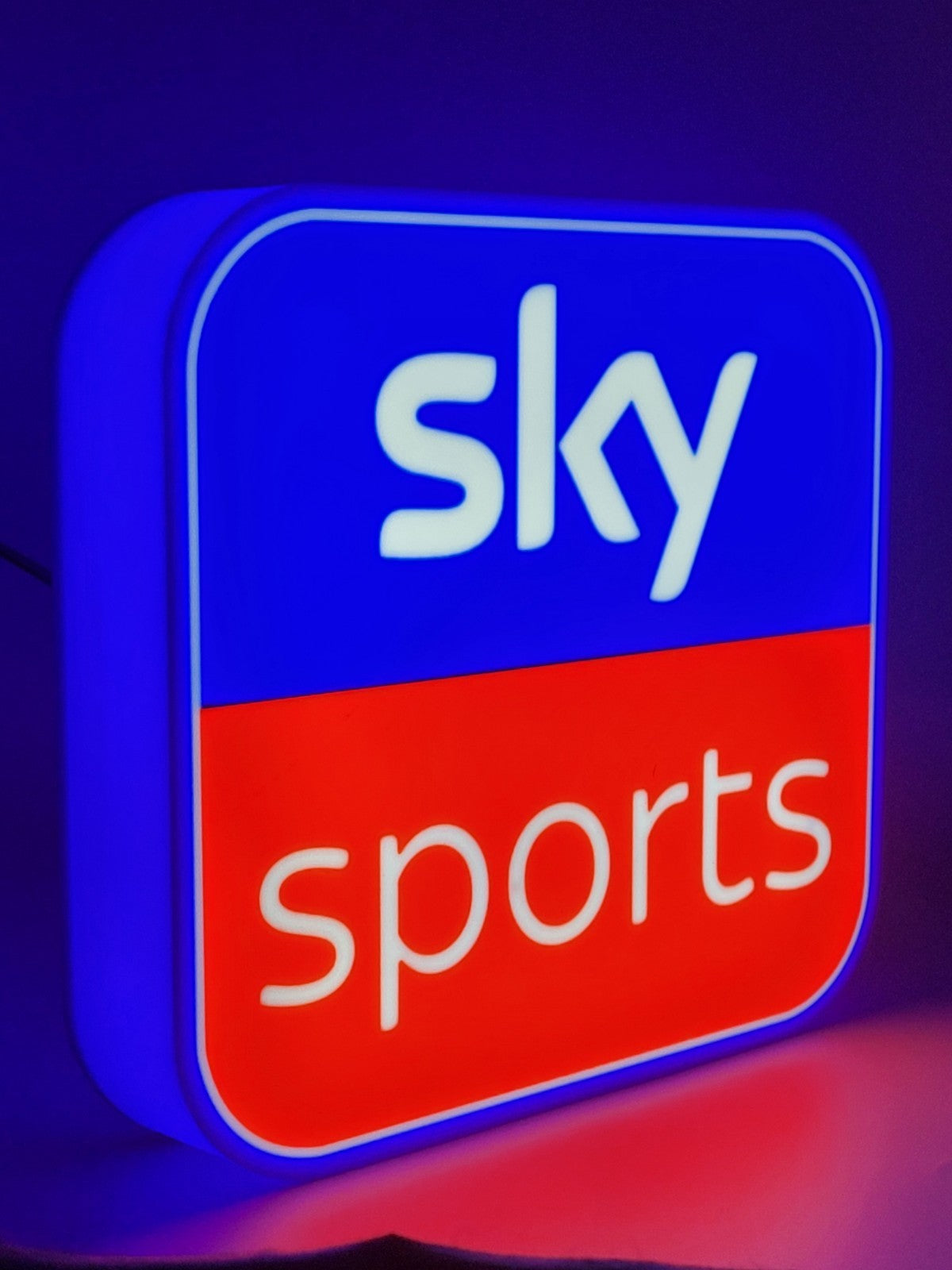 sky sports led light sign with illuminated logo side view