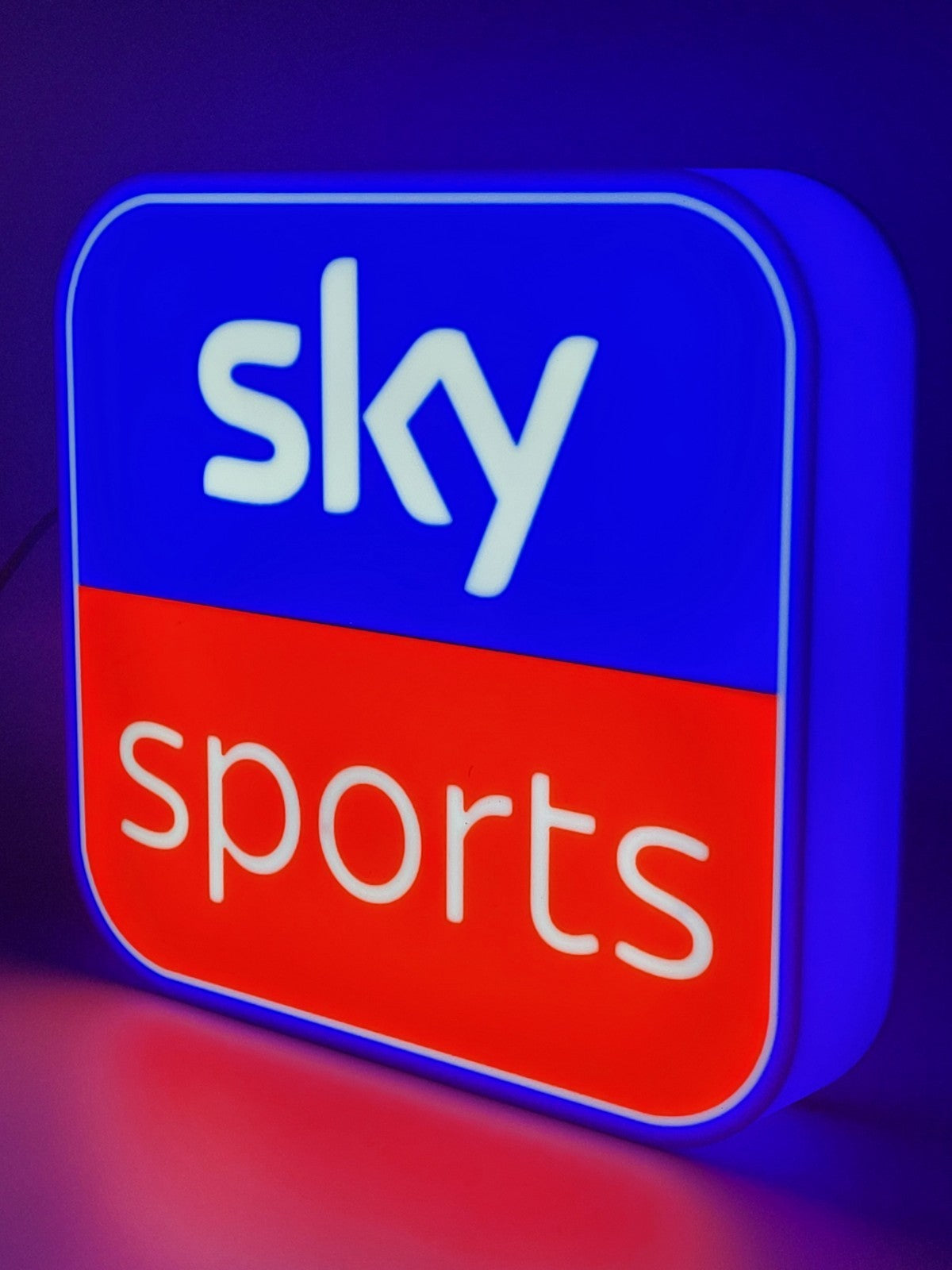 sky sports led light sign with illuminated logo side view