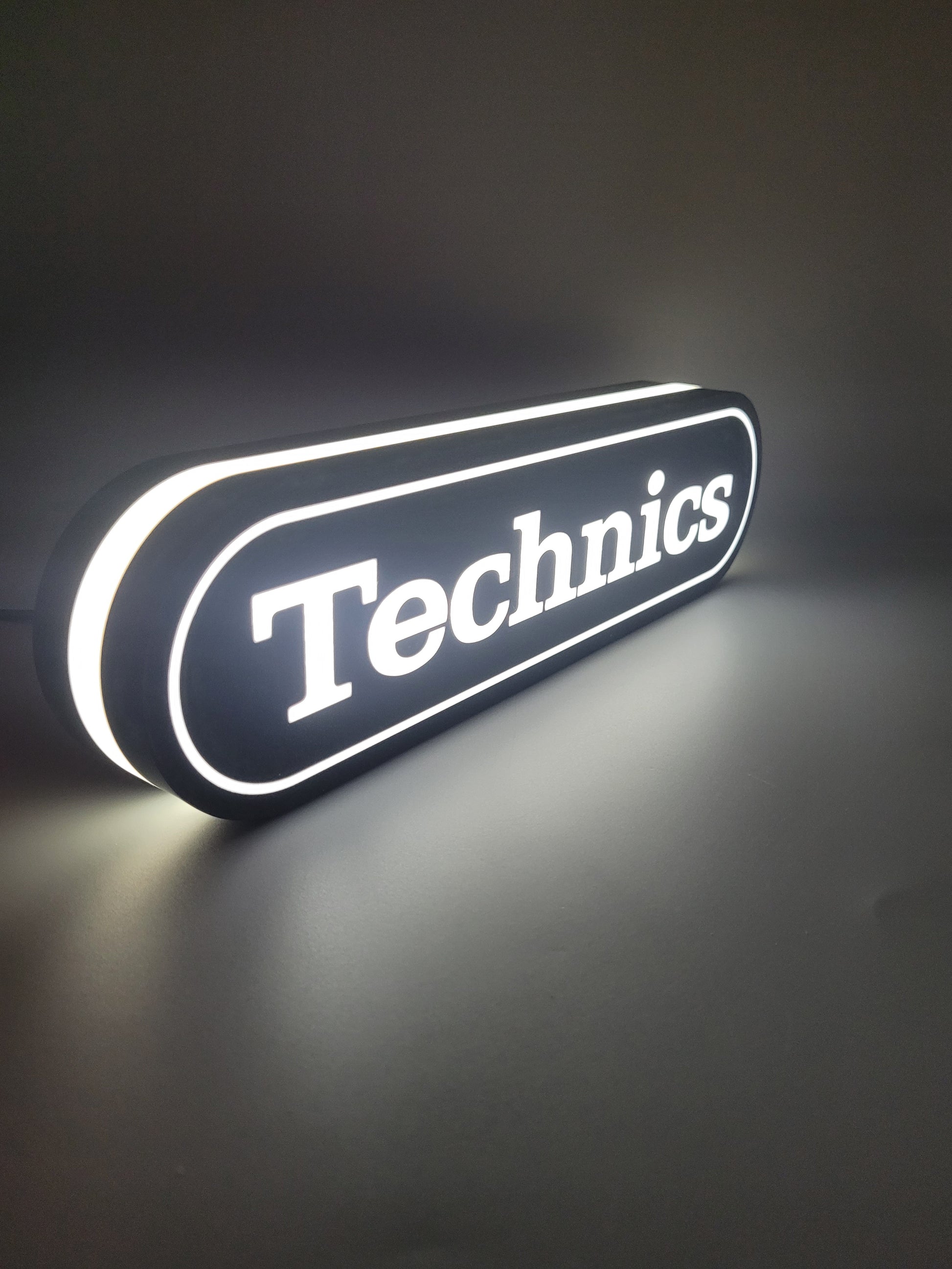 technics led light sign with illuminated logo viewed from side view