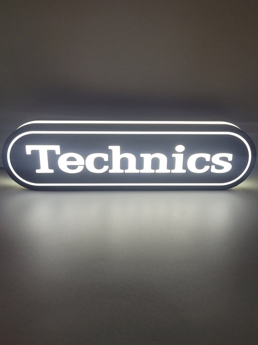 Technics LED light sign with illuminated logo viewed from straight on