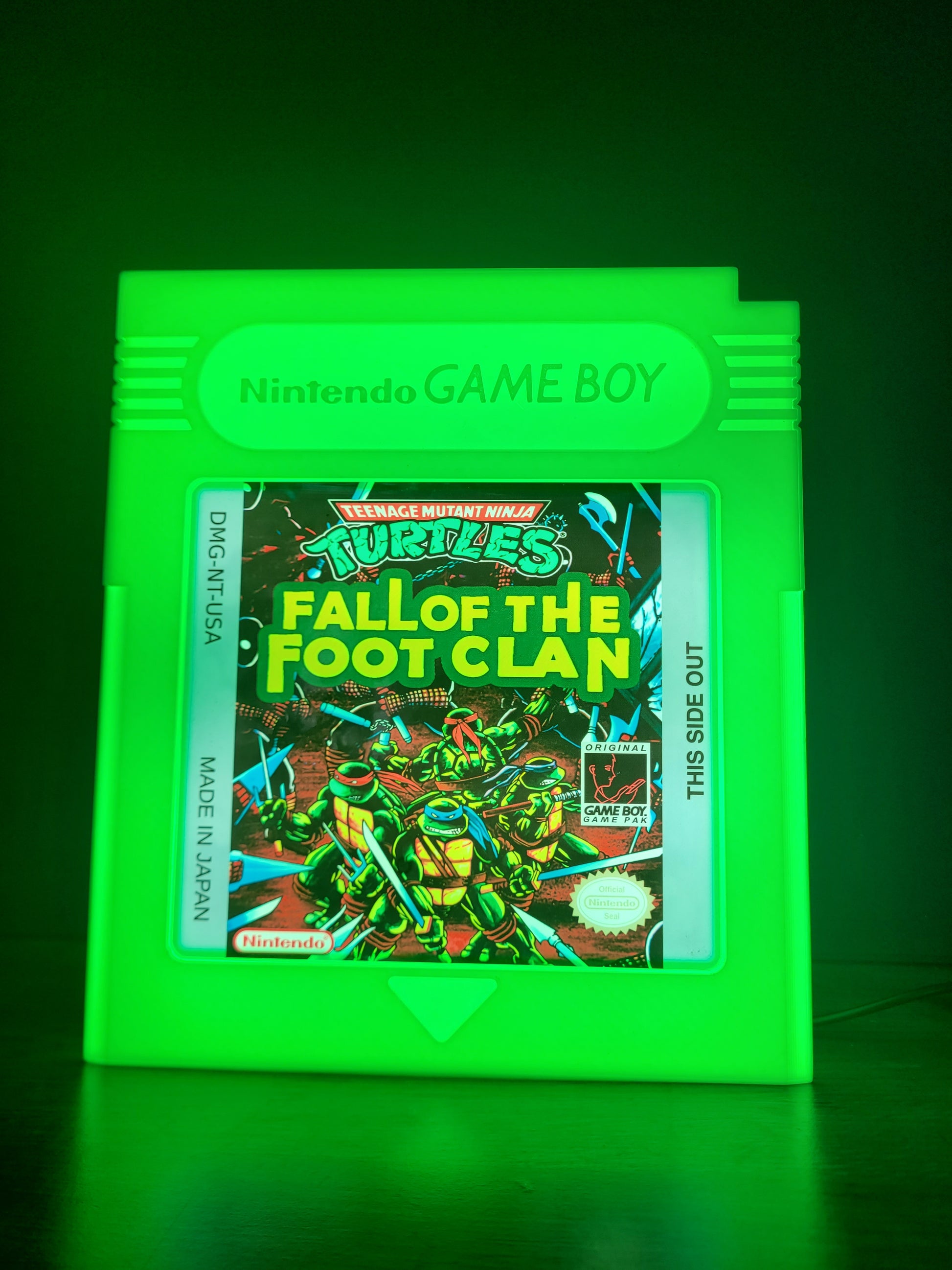 Teenage Mutant Ninja Turtle GAMEBOY CARTRIDGE LED light sign with illuminated logo viewed from straight on