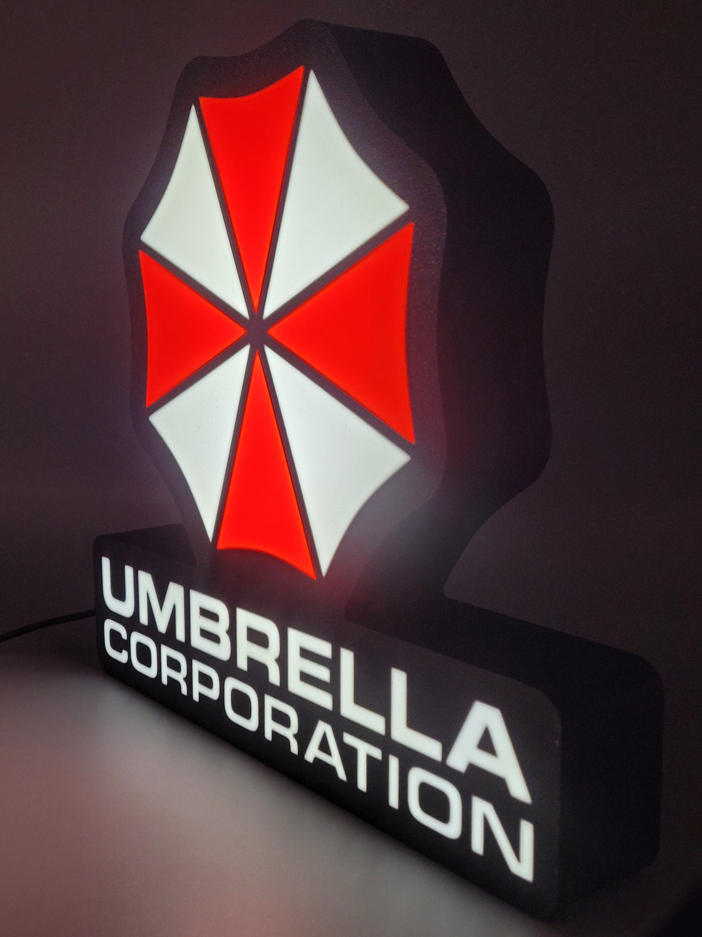 umbrella corporation led light sign with illuminated logo viewed from side view