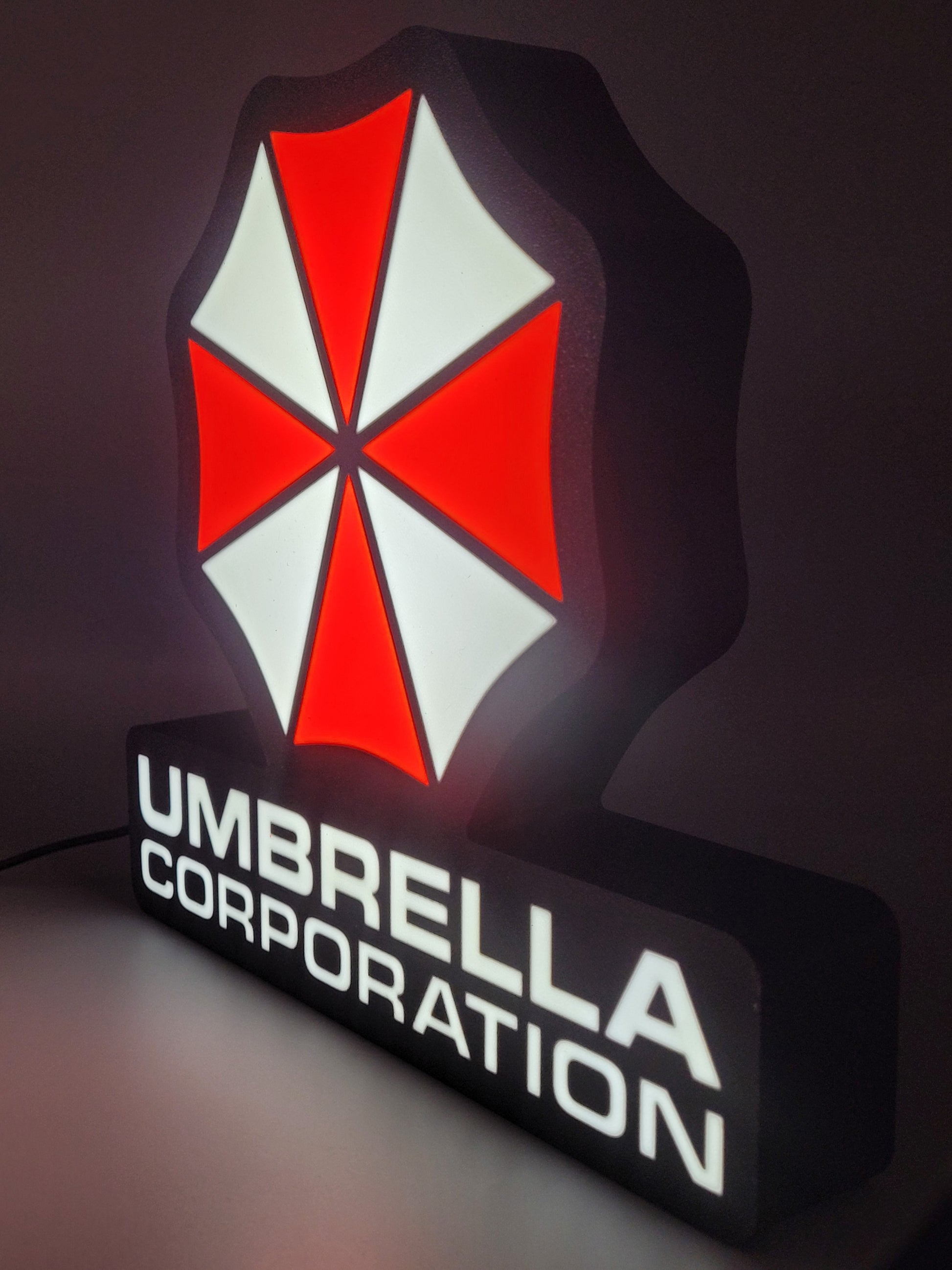 umbrella corporation led light sign with illuminated logo viewed from side view