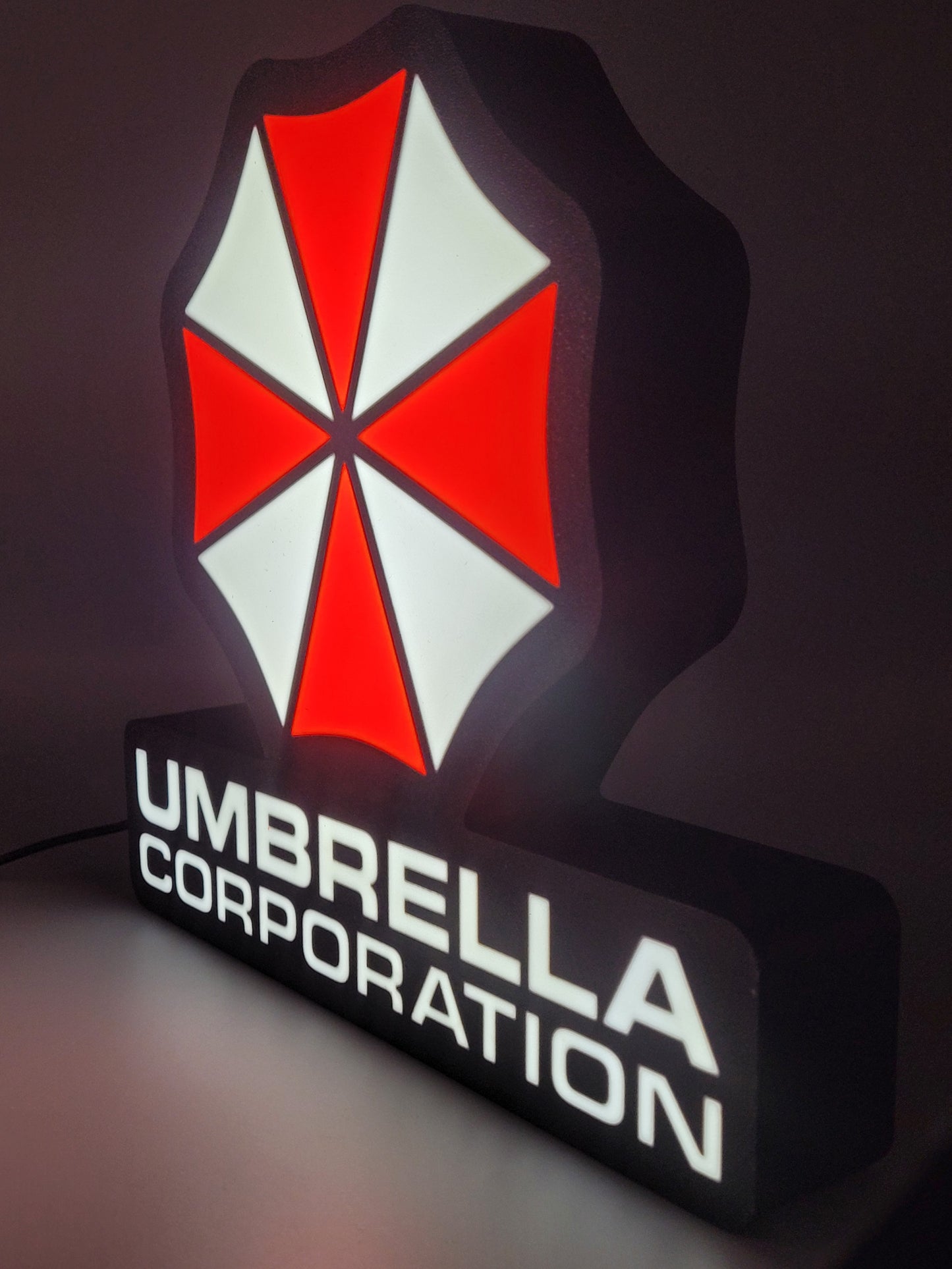 umbrella corporation led light sign with illuminated logo viewed from side view